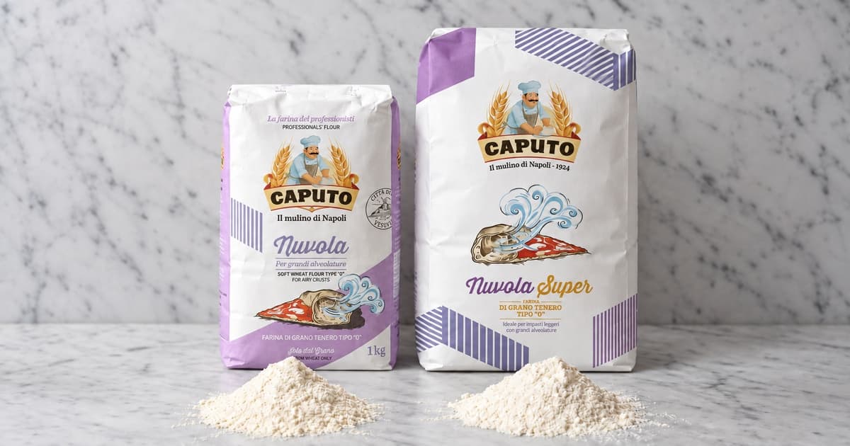 AI illustration: bags of Caputo Nuvola and Nuvola Super with two small piles of flour on a marble worktop